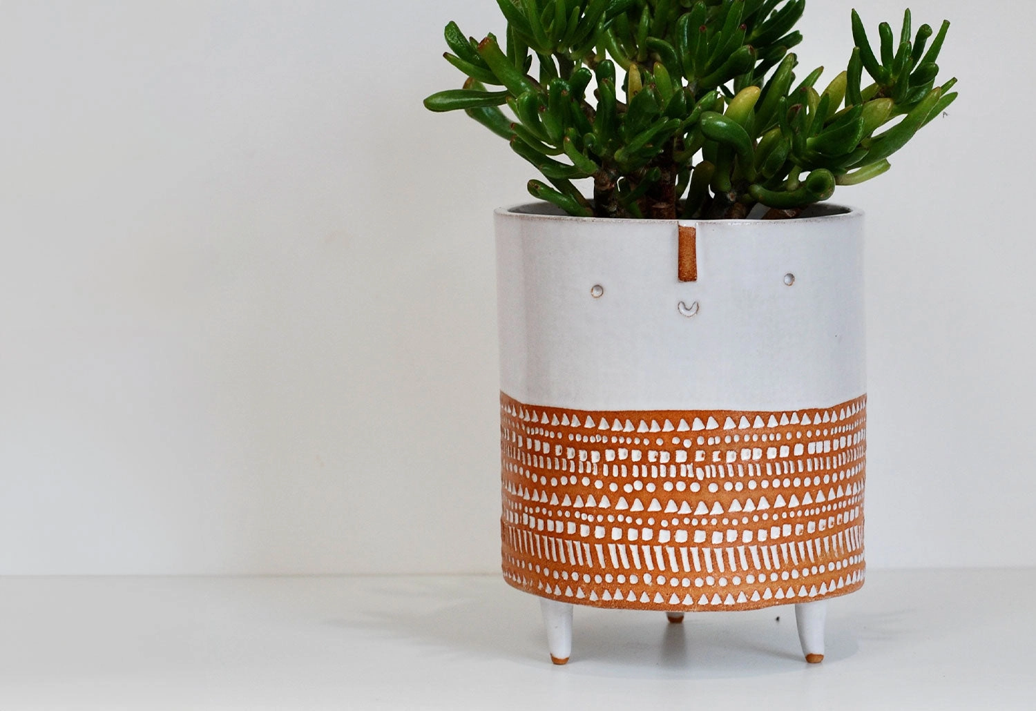 Bare Clay Stamped Tripod Pot