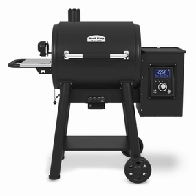 Broil King Regal Pellet 400 Smoker and Grill 495051 stainless steel BBQ grill with side table